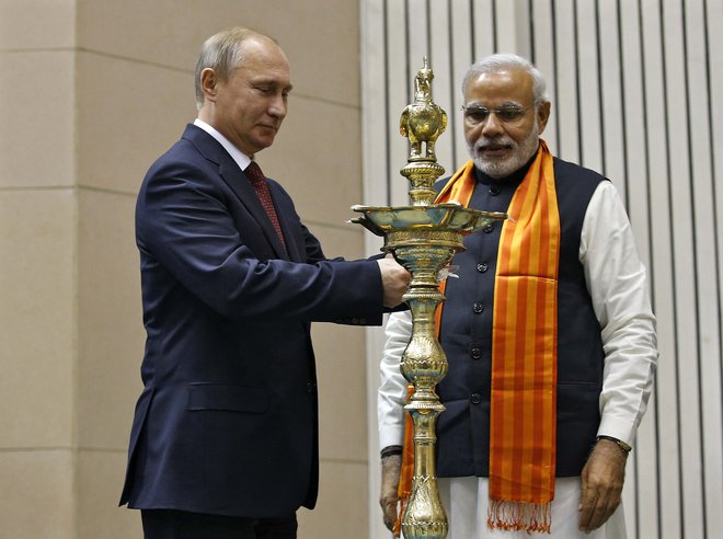 Če bi obveljala pobuda ameriškega predsednika Donalda Trumpa, bi bila na jesenski vrh G7 povabljena tudi ruski predsednik Vladimir Putin in indijski premier Narendra Modi. FOTO: Reuters