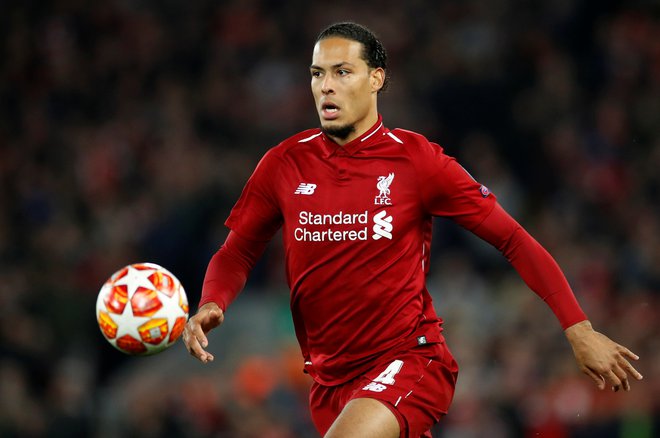 Pred enim letom so se lovorike v ligi prvakov veselili nogometaši Liverpoola, med katerimi je bil eden glavnih adutov Virgil van Dijk. FOTO: Reuters