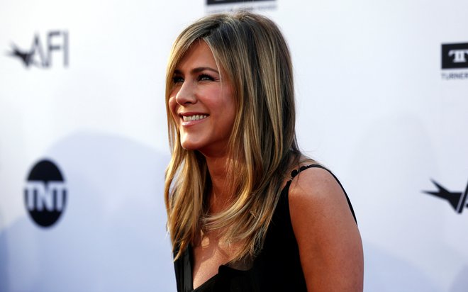 Jennifer Aniston se pogosto znajde v medijih, ko se ugiba, ali je (končno) noseča. FOTO: Mario Anzuoni/Reuters