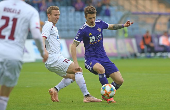 Luka Zahović (desno) in Aleš Mertelj (levo) v eni od akcij. FOTO: Tadej Regent