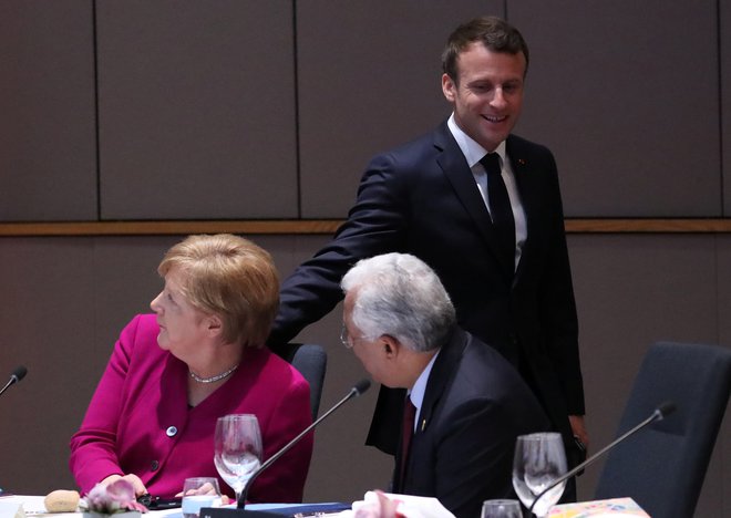 Janez Janša se je na videokonferenci sestal z Angelo Merkel in&nbsp; Antoniom Costa (na fotografiji sedeča). FOTO: Yves Herman/Reuters