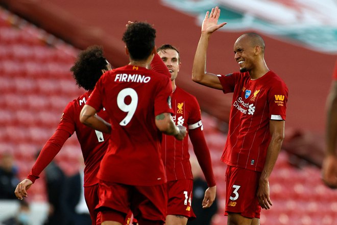 Nogometaši Liverpoola zmagujejo po tekočem traku in so tako po dolgih 30 letih tik pred naslovom prvaka. FOTO: Phil Noble/AFP