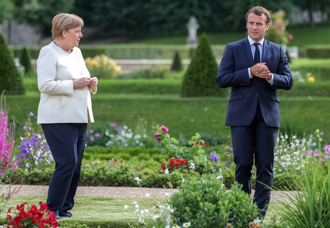 Angela Merkel in Emmanuel Macron sta govorila tudi o drugih velikih izzivih sedemindvajseterice. FOTO:&nbsp;Hayoung Jeon/Reuters