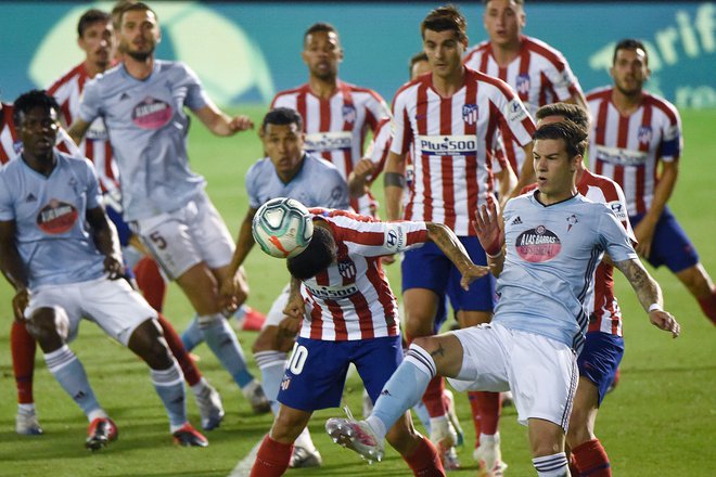 V Vigu je Atletico odlično začel, toda na koncu je iztržil le točko, ki pa ga je vseeno močno približala uvrstitvi v ligo prvakov. FOTO: Miguel Riopa/AFP