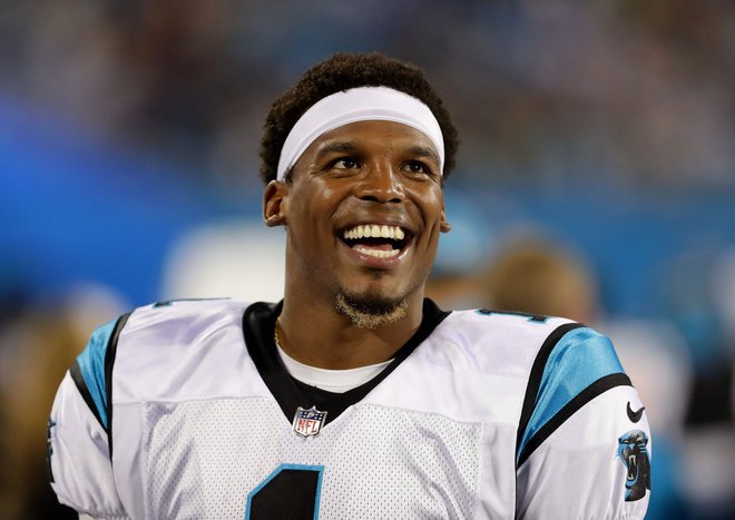 Cam Newton bo želel New England obdržati v vrhu. FOTO: Streeter Lecka/AFP