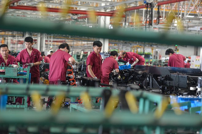 Za Peking je izjemno pomembno, da je Kitajska postala prvo veliko gospodarstvo, ki mu je uspelo povrniti rast še za časa pandemije. Foto Str/AFP