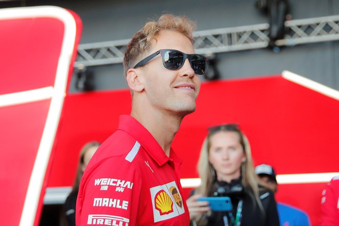 Sebastian Vettel ohranja upanje na srečen zasuk v boju za peti naslov. FOTO: Reuters