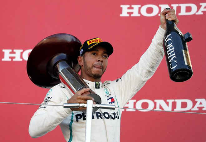 Lewis Hamilton je nadaljeval zmagoviti niz. FOTO: Isei Kato/Reuters