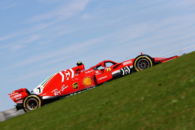 Kimi Räikkönen je zmagal prvič po uvodu v sezono 2013. FOTO: Mark Thompson/AFP