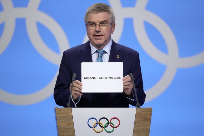 Predsednik medanrodnega olimpijskega komiteja Thomas Bach je v Lozani osrečil italijansko delegacijo. FOTO: Reuters