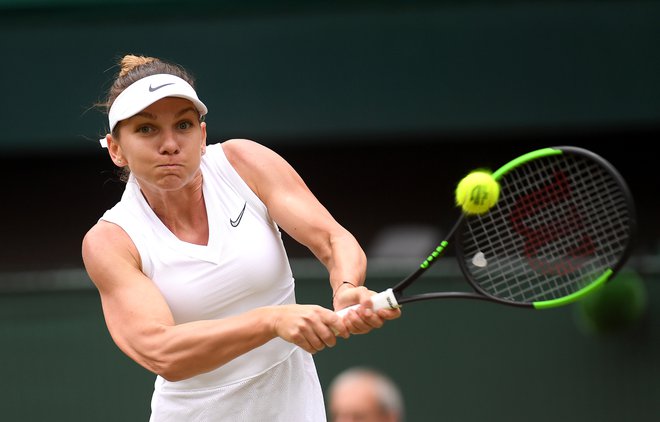 Simona Halep se je v Wimbledonu razveslila največje lovorike in bo lahko zdaj bolj sproščeno igrala na velikih slamih. Foto AFP