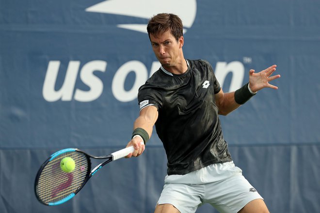 Aljaž Bedene je brez izgubljenega niza napredoval v 2. kolo OP ZDA. FOTO: AFP