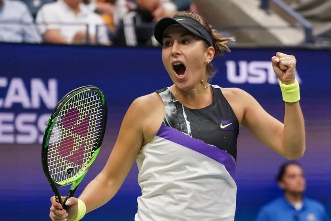 Belinda Benčič je še tretjič letos ugnala Naomi Osaka in se po petih letih spet prebila v četrtfinale OP ZDA. FOTO: AFP