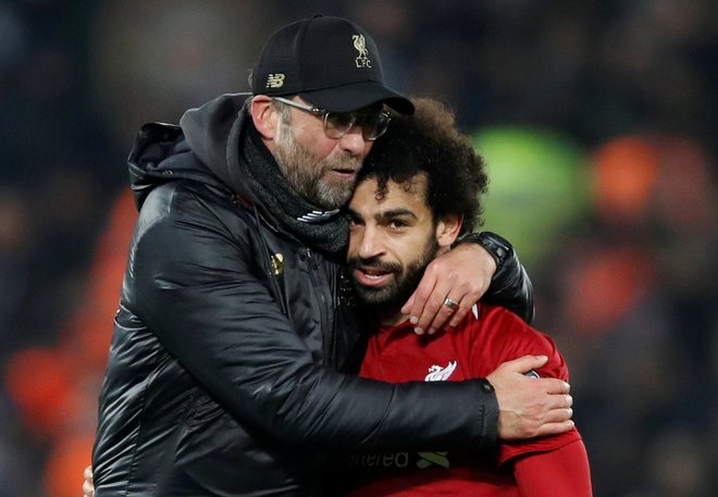 Jürgen Klopp in Mohamed Salah sta Liverpoolu prinesla tako dolgo pričakovano lovoriko. FOTO: Carl Recine/Reuters