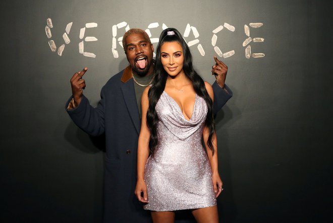 Kim Kardashian in Kanye West iz časov, ko težav še ni bilo niti slutiti. FOTO: Allison Joyce/Reuters