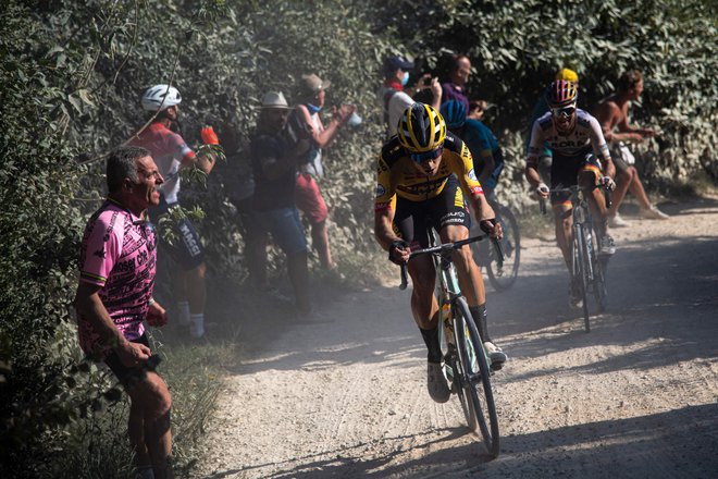 Wout van Aert se je najbolje znašel na razbeljenem toskanskem makadamu. FOTO: AFP