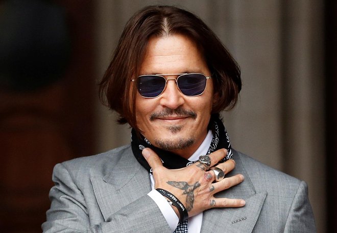 Johnny Depp med sojenjem v Londonu. FOTO: Peter Nicholls/Reuters