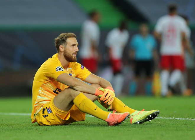 Vratar Jan Oblak je bil po porazu Atletica vidno razočaran. FOTO: Miguel A. Lopes/Reuters