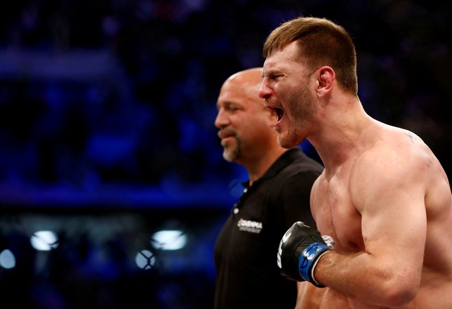 Stipe Miočić je ubranil šampionski pas združenja UFC v težki kategoriji. FOTO: Rodolfo Buhrer/Reuters