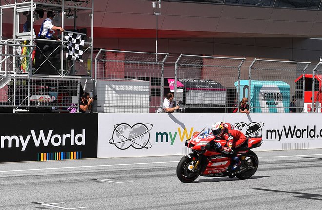 Andrea Dovizioso je na Spielbergu dosegel svojo prvo zmago sezone. FOTO: Joe Klamar/AFP