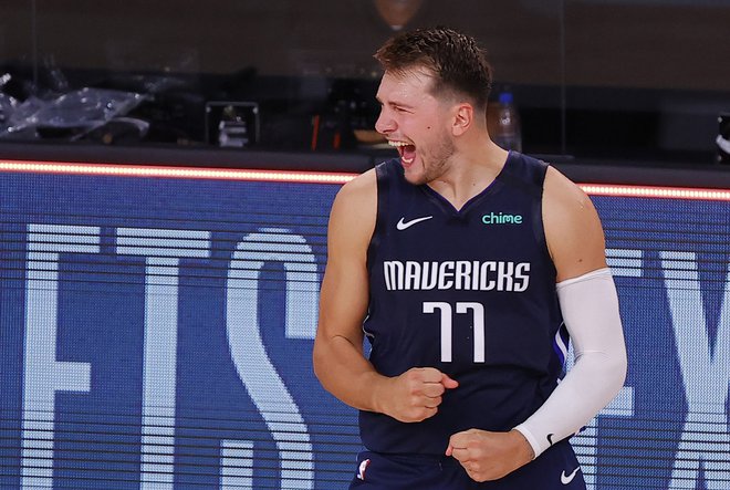Luka Dončić se veseli nadaljevanja končnice lige NBA. Foto Kevin C. Cox/AFP