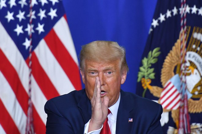 Donald Trump je v začetku tedna obiskal Kenosho, mesto, kjer je bil ustreljen temnopolti Jacob Blake, predvsem zato, da bi se zahvalil organom pregona. Foto Mandel Ngan/Afp