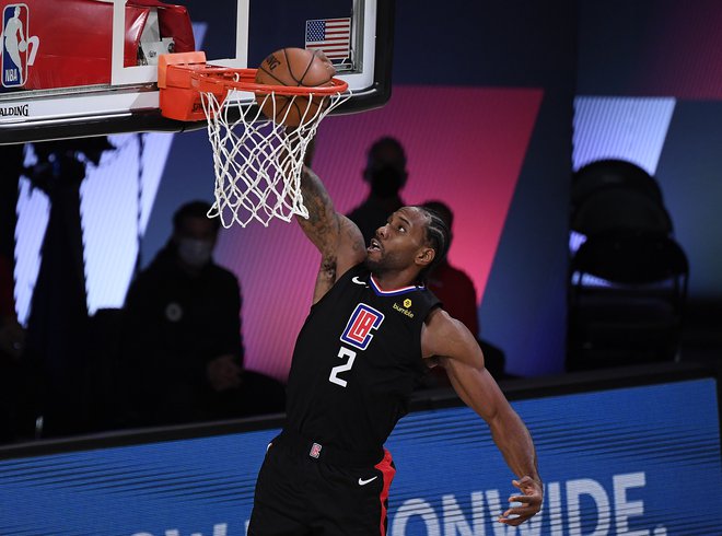 Kawhi Leonard je znova prispeval levji delež k zmagi moštva Los Angeles Clippers. FOTO: Douglas P. Defelice/AFP