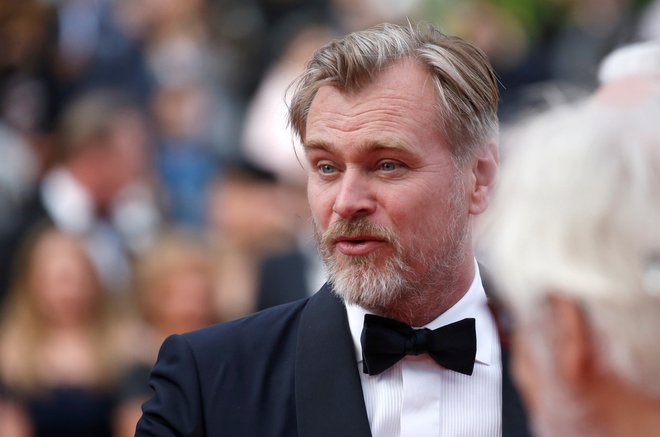 Režiser Christopher Nolan se je s časom v svojih filmih poigral že večkrat. FOTO: Stephane Mahe/Reuters