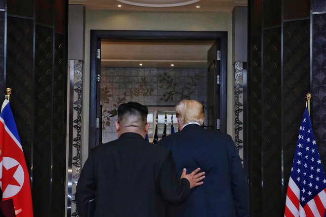 Ameriški predsednik Donald Trump in severnokorejski vodja Kim Džong Un FOTO: AFP