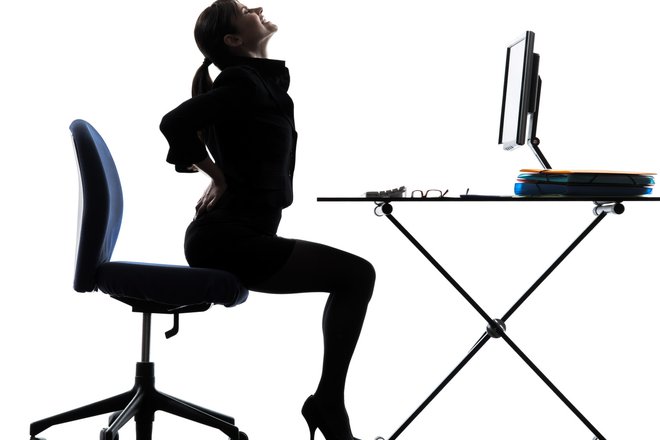 one business woman sitting backache pain  silhouette studio isolated on white background; Shutterstock ID 138435938; PO: aol; Job: production; Client: drone