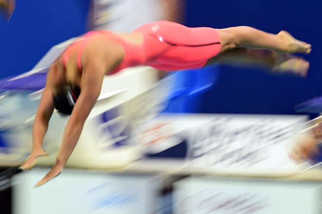 Slovenia's Nastja Govejsek competes in the preliminary heats of the women's 50m freestyle swimming event at the 2015 FINA World Championships in Kazan on August 8, 2015. AFP PHOTO / ALEXANDER NEMENOV