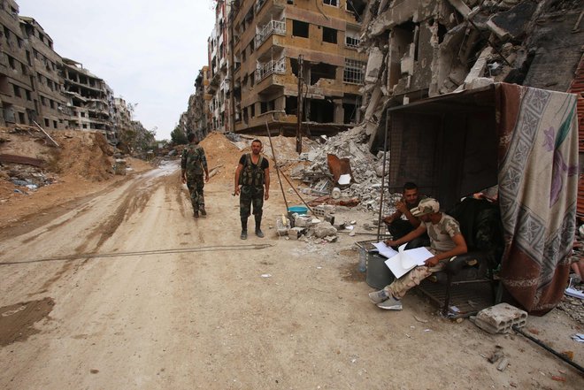 Vojna v Siriji se še kar nadaljuje. FOTO: AFP