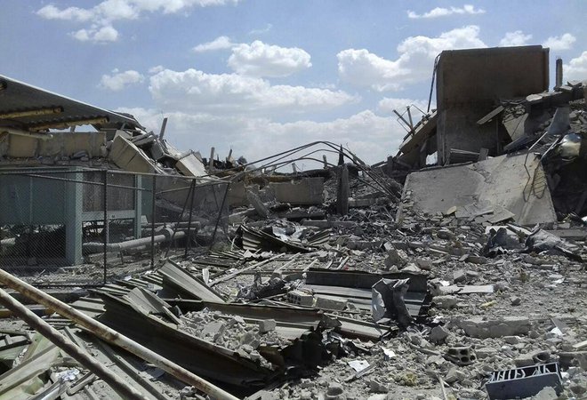Sirske oblasti so objavile fotografije, ki prikazujejo uničenje. FOTO: AP
