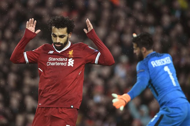 Mohamed Salah je k Liverpoolu prišel ravno iz Rome. FOTO: AFP