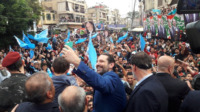 Samozavestni predsednik vlade Sad Hariri na enem izmed zborovanj FOTO: Reuters