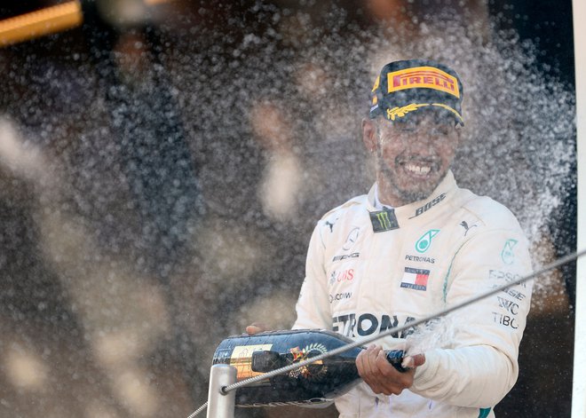 Lewis Hamilton je vpisal 64. zmago v karieri. Foto: AFP