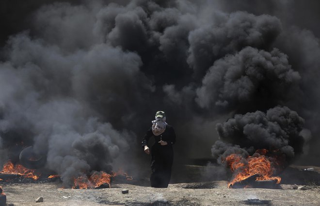 Svet ZN za človekove pravice se je na zahtevo več držav v petek sestal na izrednem zasedanju zaradi nedavnega nasilja na območju Gaze. FOTO: Khalil Hamra/AP