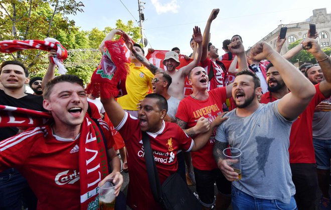 Navijači Liverpoola imajo v Kijevu občutno premoč. Jo bodo imeli tudi na igrišču? FOTO: Sergei Supinsky/Afp