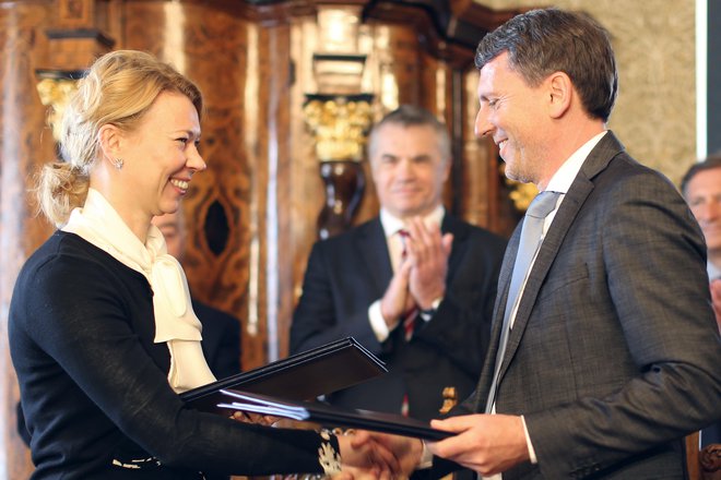 Podpis pogodbe med družbama Geoplin in Gazprom,Boštjan Napast in Elena Burmistrova.