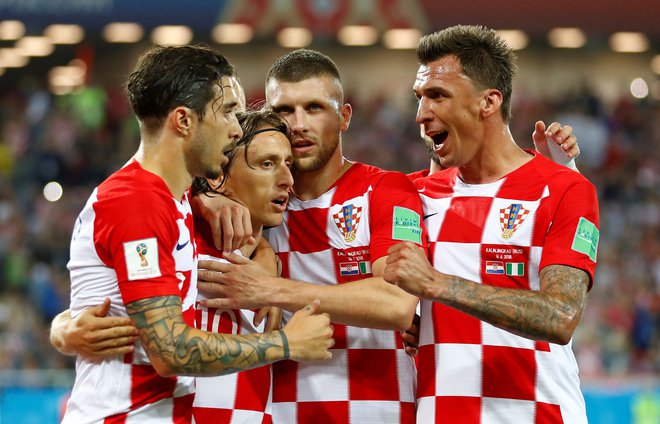 Šime Vrsaljko, Luka Modrić, Ante Rebić in Mario Mandžukić. Foto Fabrizio Bensch/Reuters