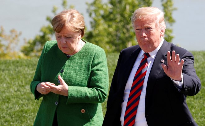 Trump kot vzrok za zaostrovanje svoje migrantske politike navaja tudi Nemčijo. FOTO: Yves Herman/Reuters