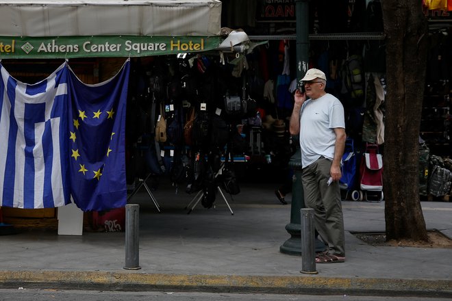 Grčija se sicer zavezuje, da bo do leta 2022 zagotavljala primarni presežek v vrednosti 3,5 odstotka BDP.&nbsp; FOTO: Costas Baltas/Reuters