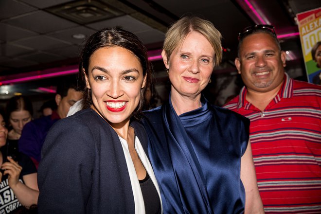 NEW YORK, NY - JUNE 26: Progressive challenger Alexandria Ocasio-Cortez is joined by New York gubenatorial candidate Cynthia Nixon at her victory party in the Bronx after upsetting incumbent Democratic Representative Joseph Crowly on June 26, 2018 in New York City. Ocasio-Cortez upset Rep. Joseph Crowley in New Yorks 14th Congressional District, which includes parts of the Bronx and Queens.   Scott Heins/Getty Images/AFP
== FOR NEWSPAPERS, INTERNET, TELCOS & TELEVISION USE ONLY ==