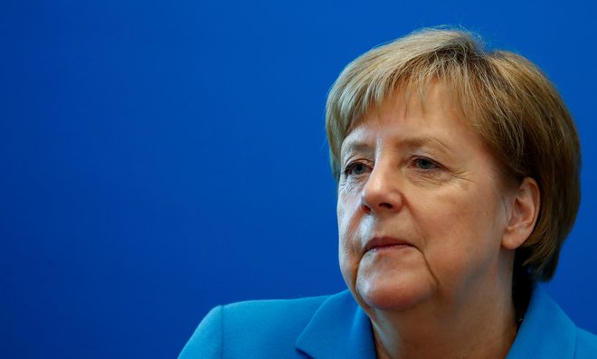 Merklova si želi, da bi CDU in CSU še naprej delali skupaj. »Ker smo zgodba o uspehu za Nemčijo,« je dejala. FOTO: Axel Schmidt/Reuters