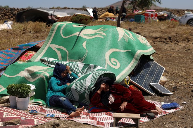 Sirski begunci na Golanski planoti. FOTO: Reuters