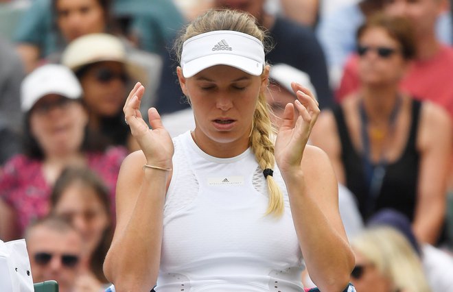 Caroline Wozniacki ni upravičila vloge favoritinje. Foto Toby Melville/Reuters