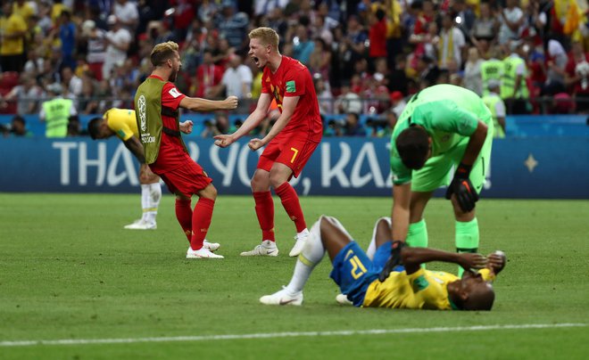 Kevin De Bruyne (št. 7) je z velemojstrskim golom spravil Brazilce v obup. FOTO: Reuters