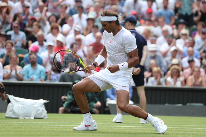 Rafael Nadal je v zadnjih letih pokazal zelo povprečno igro na travi, a letos se spet zdi tisti pravi, vedno nevarni Rafa. Foto Daniel Leal-olivas/Afp