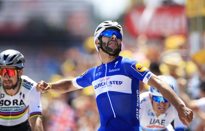 Fernando Gaviria je na prvi etapi na Touru doslej v karieri opravil s konkurenco. Foto Peter Dejong/AP