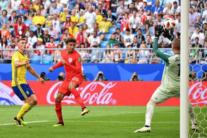 Dele Alli je z glavo potrdil angleški polfinale. Foto Yuri Cortez/AFP